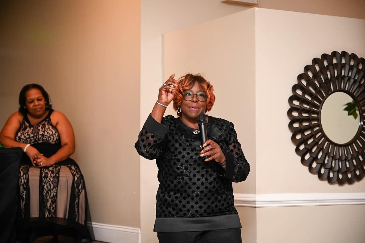 Overseer Mamie V. Gamble speaking to the congregation